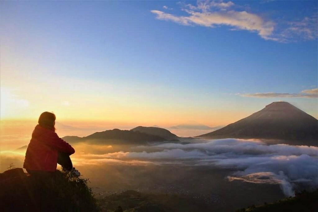 Dieng Golden Sunrise with clouds and mountains