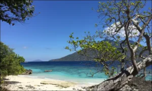 Discover Kepa Island Beach in Alor, Indonesia – pristine white sand, turquoise waters, and vibrant coral reefs