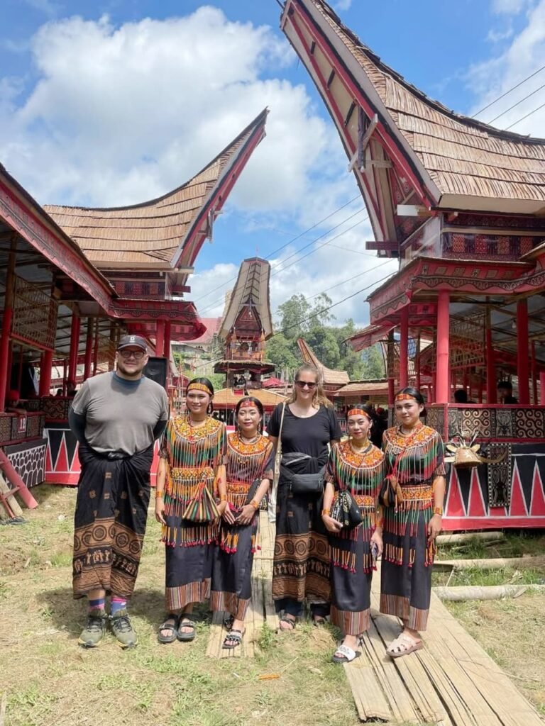Local Toraja girls wearing traditional clothing – Toraja Cultural Tour